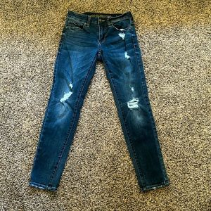 American Eagle dark blue distressed skinny jeans. Size 28x30.
